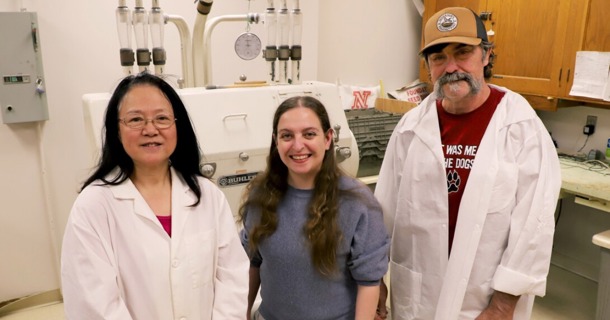 From left in the Department of Agronomy and Horticulture's grain quality lab are Lan Xu, grain quality research manager; Katherine Frels, assistant professor of agronomy and horticulture and director of the Small Grains Breeding and Genetics Program; and Marc Walter, research technician. (Fran Benne/Agronomy and Horticulture)