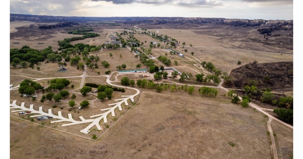 With a blackened landscape nearby, Fort Robinson State Park's historical buildings stand unscathed. Justin Haag, Nebraska Game and Parks Commission